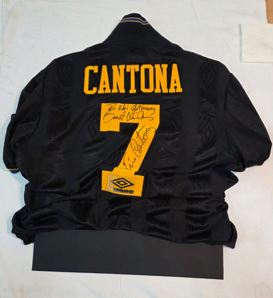 emmarcar samarreta cantona
